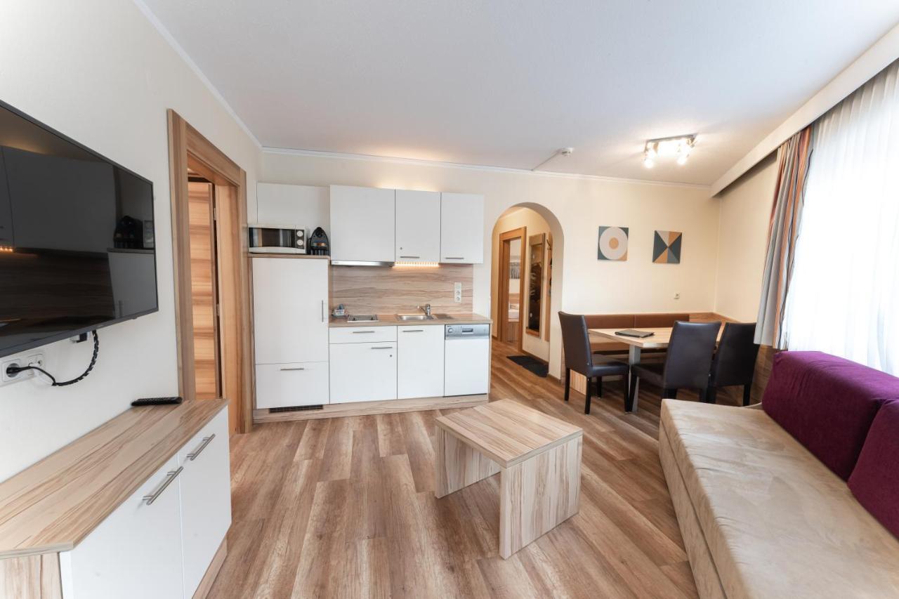 Aparthotel Dorfplatzl Garni Tux Bagian luar foto