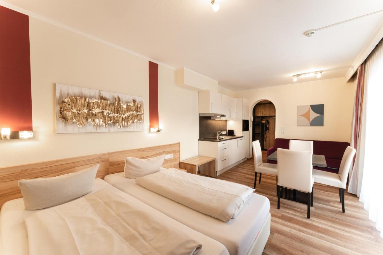 Aparthotel Dorfplatzl Garni Tux Bagian luar foto