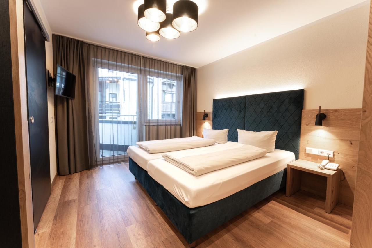 Aparthotel Dorfplatzl Garni Tux Bagian luar foto