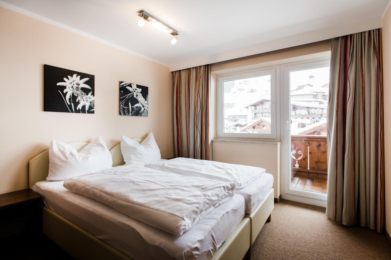 Aparthotel Dorfplatzl Garni Tux Bagian luar foto