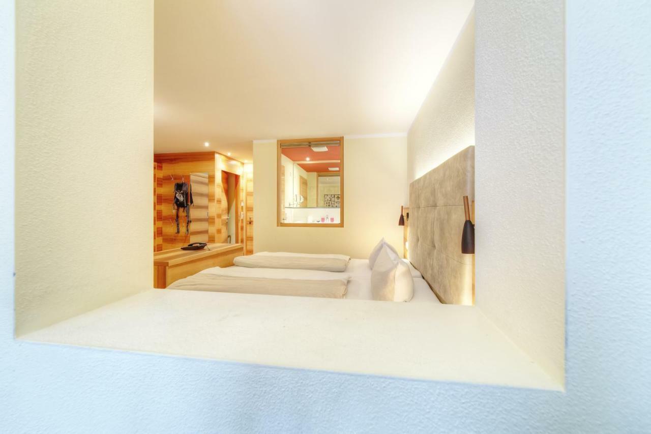 Aparthotel Dorfplatzl Garni Tux Bagian luar foto